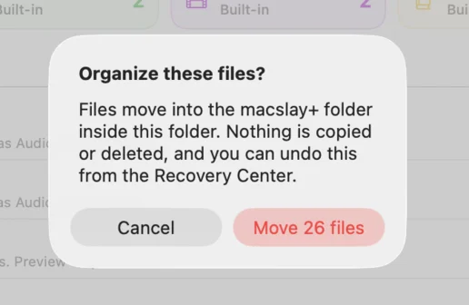 The confirmation before apply: Organize these files? Files move into the macslay+ folder, nothing is copied or deleted, and you can undo this. Cancel or Move 26 files